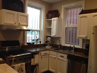 Real wood cabinets & granite counters!