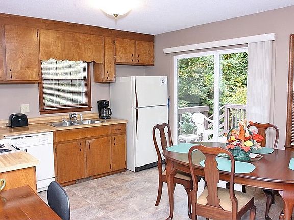 Kitchen with access to updated and newly stained deck.  Great for bbqs!