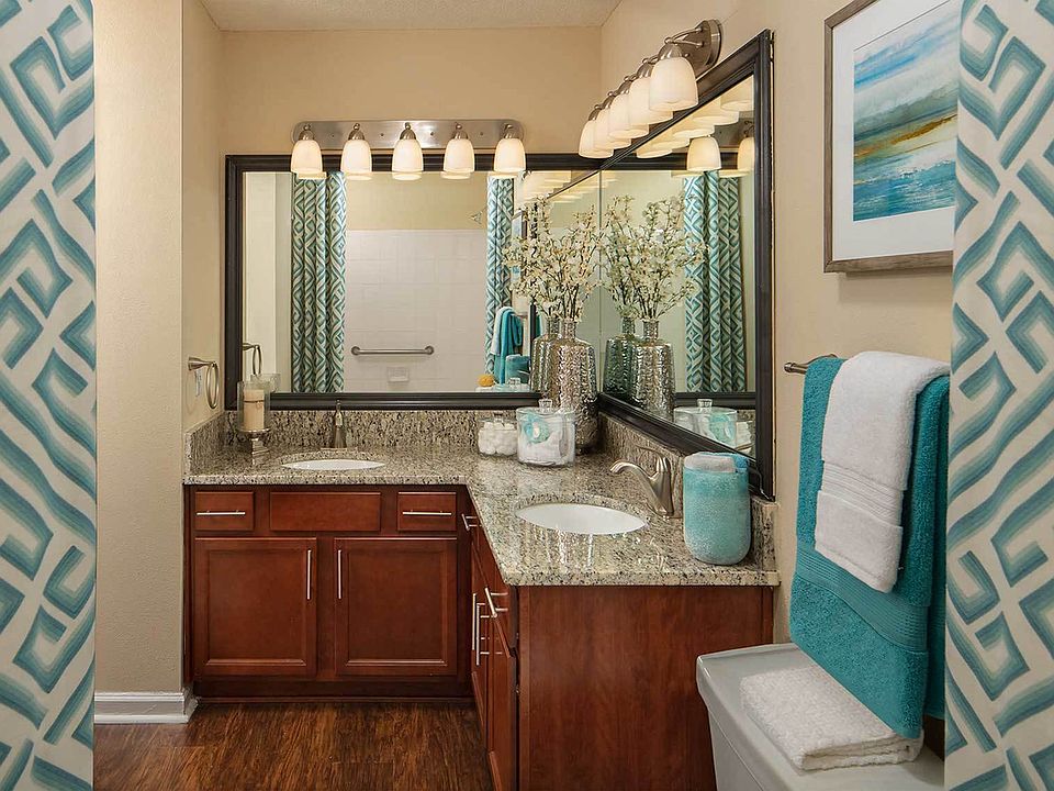 Bathroom with wood style flooring and granite countertops
