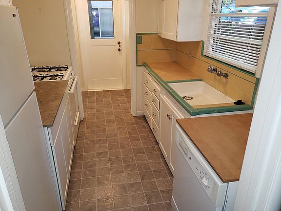 Kitchen with view to utility room