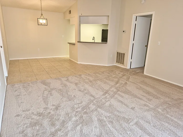Lounge view to dining area and open plan kitchen