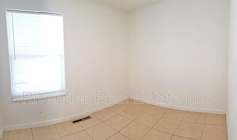 1496 Joliet St — Photo 7