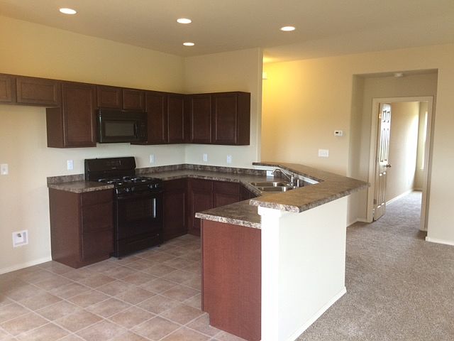 2nd image of 12810 E 67th Place N