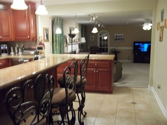 Main Kitchen into Family Rm