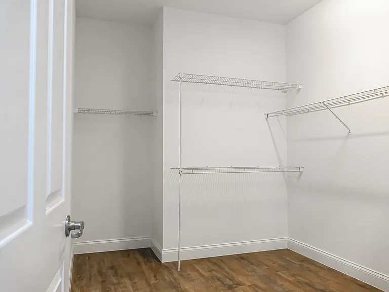 Oversized Master bedroom closet. LVT flooring