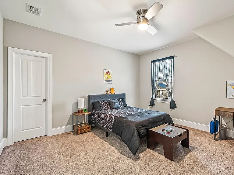 Bedroom 2- front of house, with two walk-in closets