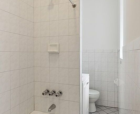 5th image of 249 E 7th St APT 6