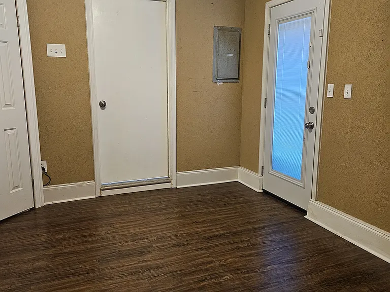 Side door to/from Bedroom #3 to back/side yard.