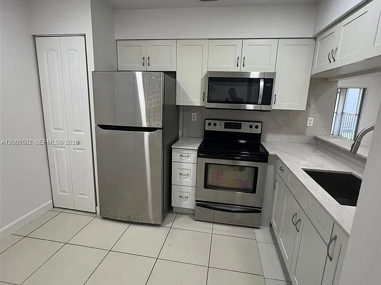 9203 SW 138th Pl #9203 — Photo 11