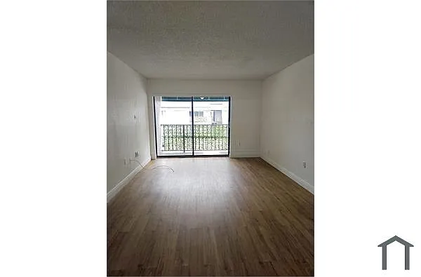 Building Photo - 7423 SW 152nd Ave #10-203