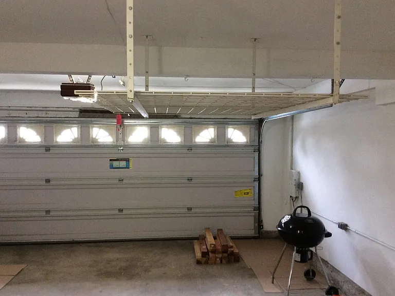 Garage with upper storage racks