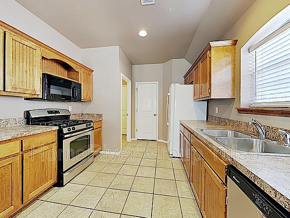 4th image of 8925 N 152nd East Ave