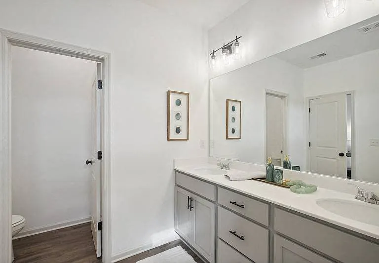 Separate toilet area for added privacy and convenience.