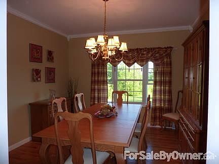 Formal Dining Room
						:
						From the kitchen. View to front yard.