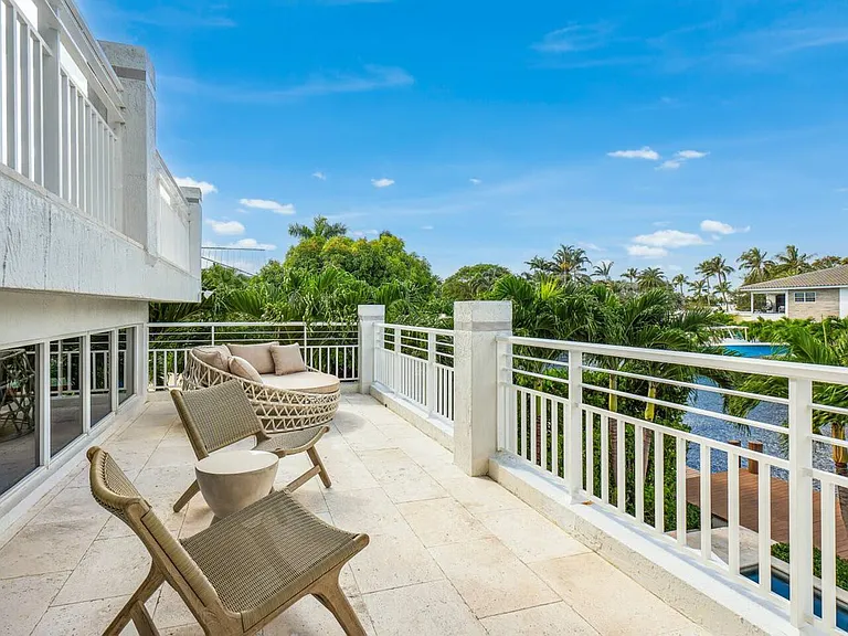 Private balcony with comfortable seating, perfect for enjoying morning coffee or evening sunsets.