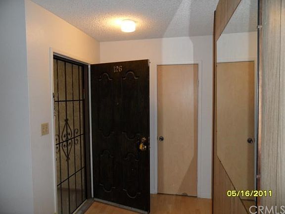 Entry with closet and security screen door