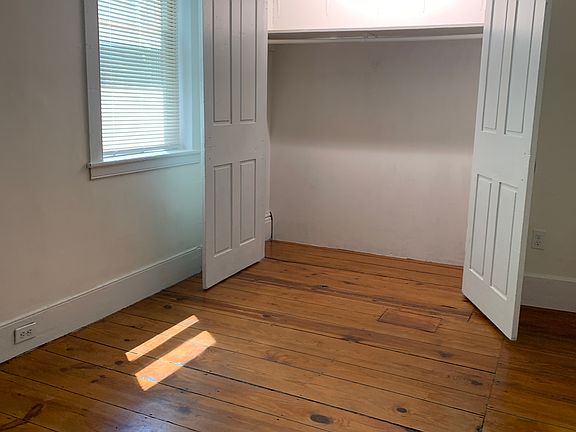 Bedroom 2, well-lit closet with two shelves