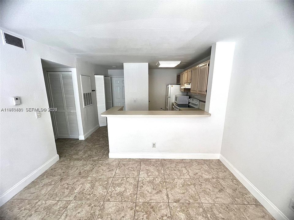 1st image of 1845 Palm Cove Blvd APT 308