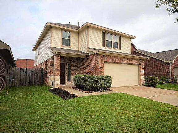 This Lennar built home has never flooded and is located in The Enclave At Bay Colony.  Lovely brick and stone exterior and no back neighbors.