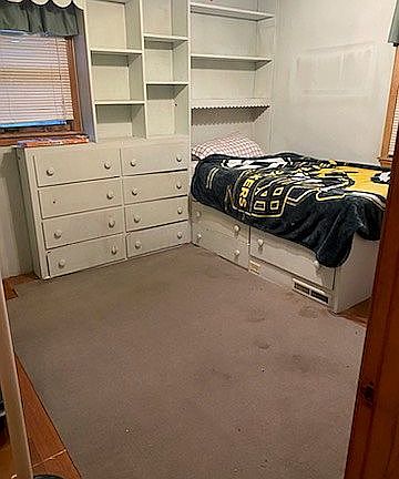 bedroom with built-ins