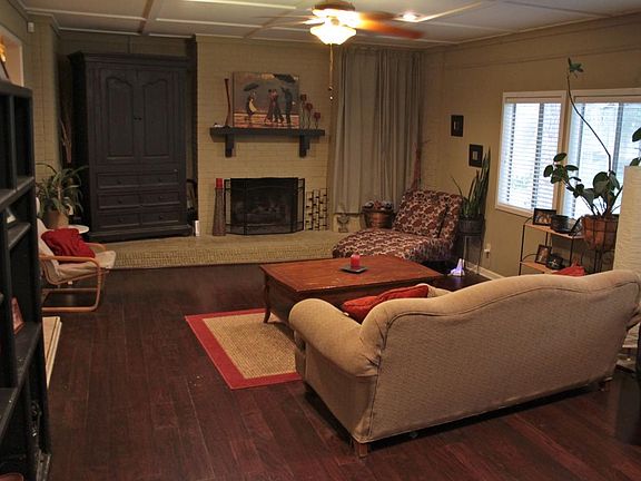 Living room (indoor grill behind curtain to right of gas fir