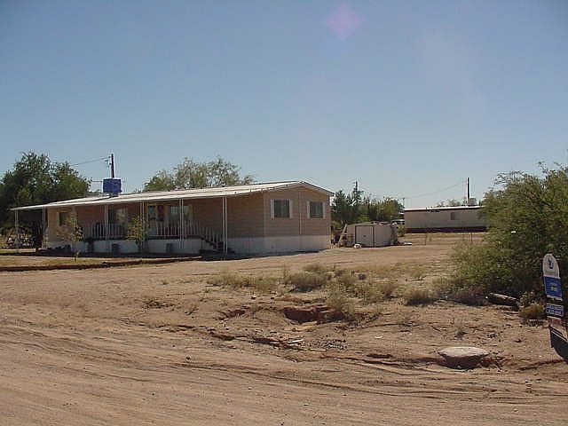 Side of home w shed