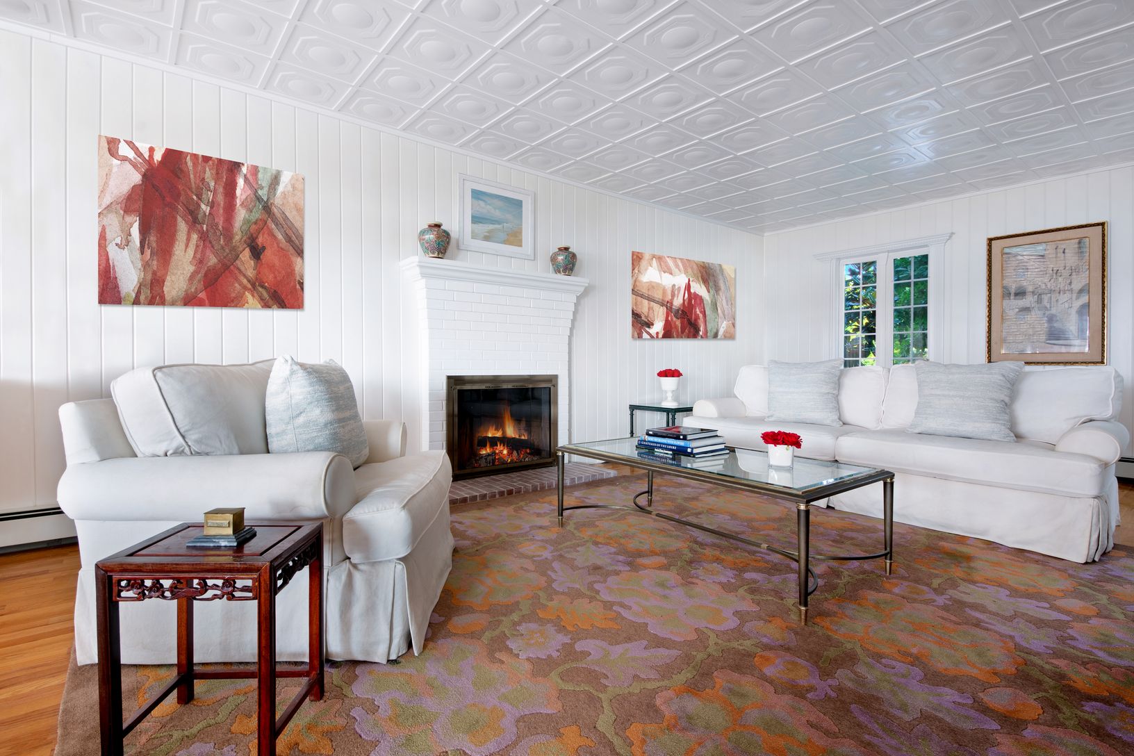 LIVING ROOM WITH WOOD BURNING FIREPLACE