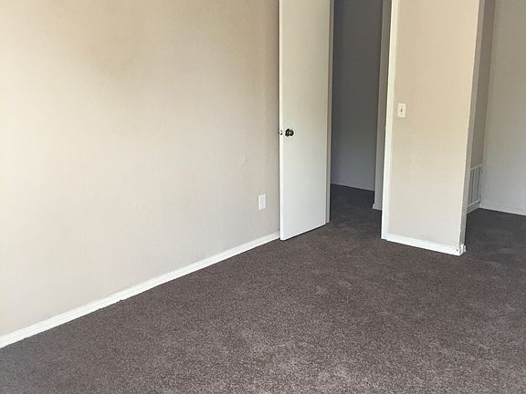Living room with access to large closet