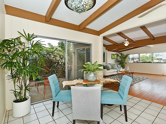 Dining room, view of living room and covered lanai.