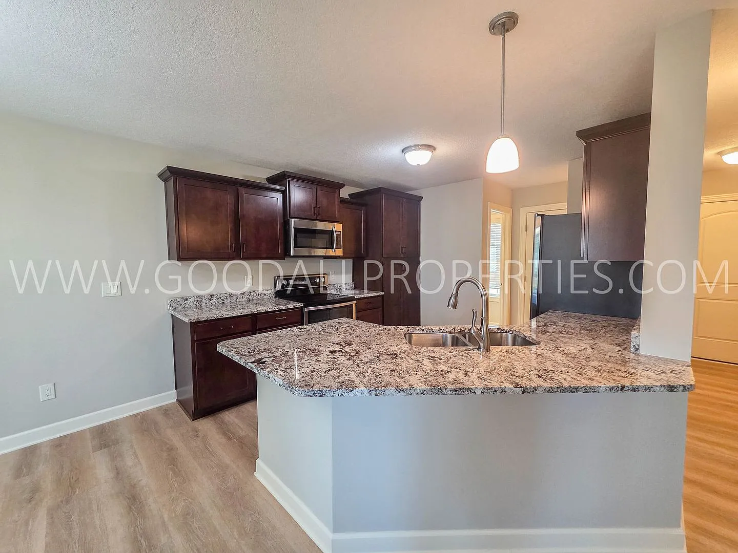 4 Bed Waukee Home with Granite Counters & Covered Deck — Photo 3