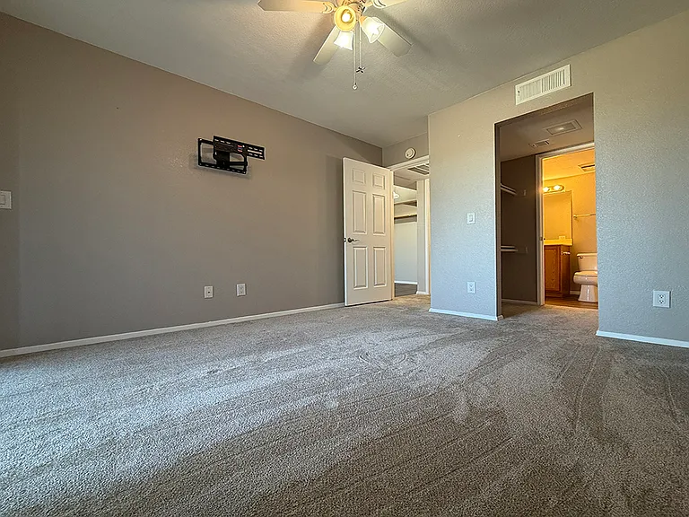 Second Bedroom View to the Entrance door and walk-in Closet