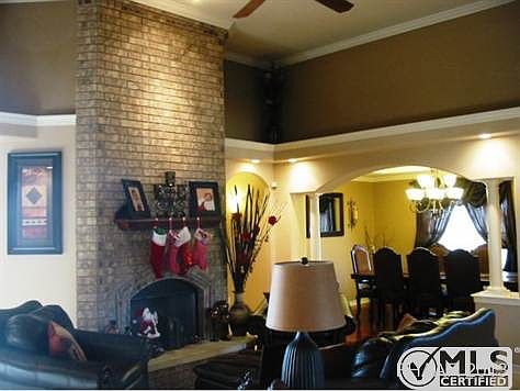 Living room w/ soaring ceiling