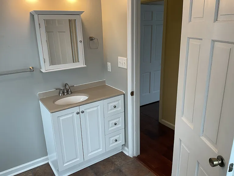 Main Floor Bath Vanity with Storage in Medicine Cabinet.