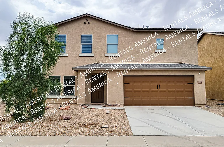 229 E Watson Pl — Photo 1