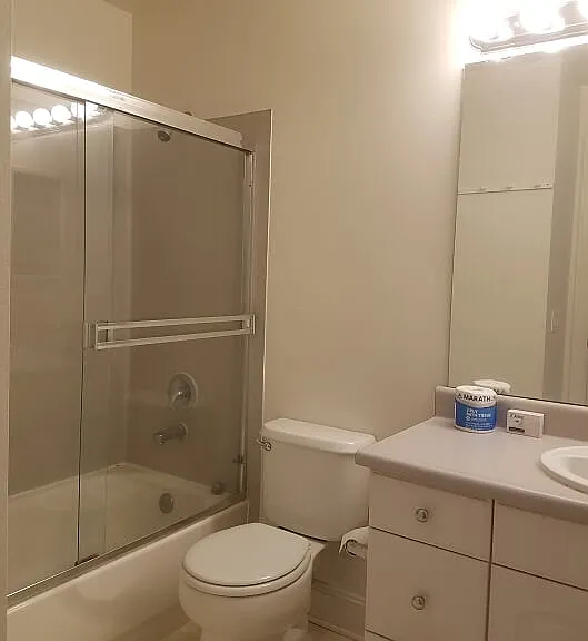 Bathroom with tub and shower.