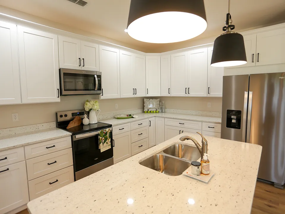 Front cottage Large custom cabinets with stainless steel appliances