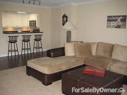 View from living room to open kitchen : This is a view from living room looking towards the open kit