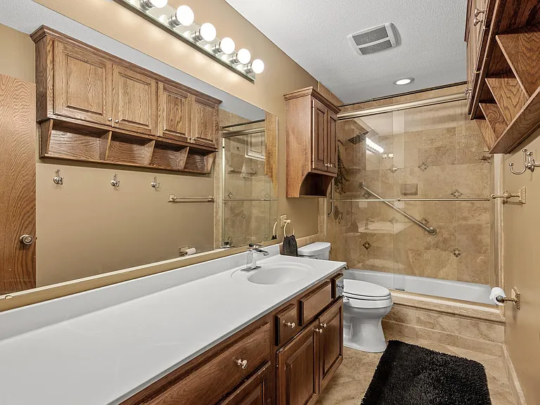 Full bathroom on second level. In between master bedroom and second bedroom.