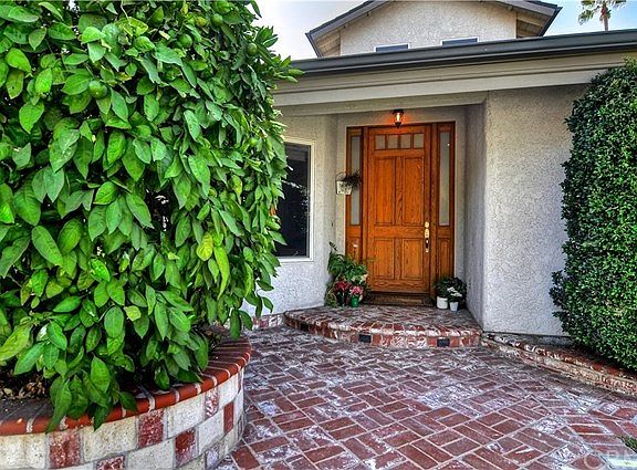 8' Tall Entry Door w/ Beautiful Brick Entry