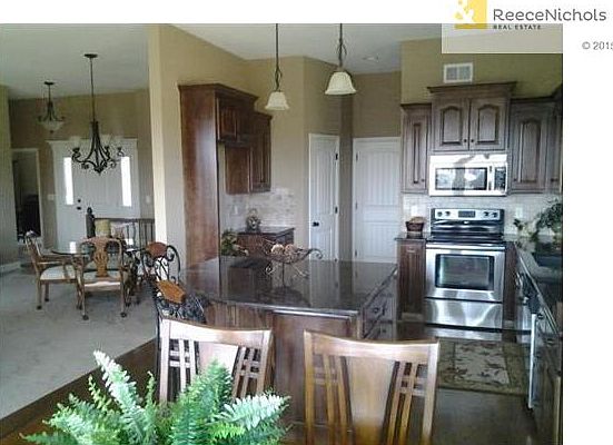 Lovely open space and your beautiful kitchen!  (photos from a prior model home)