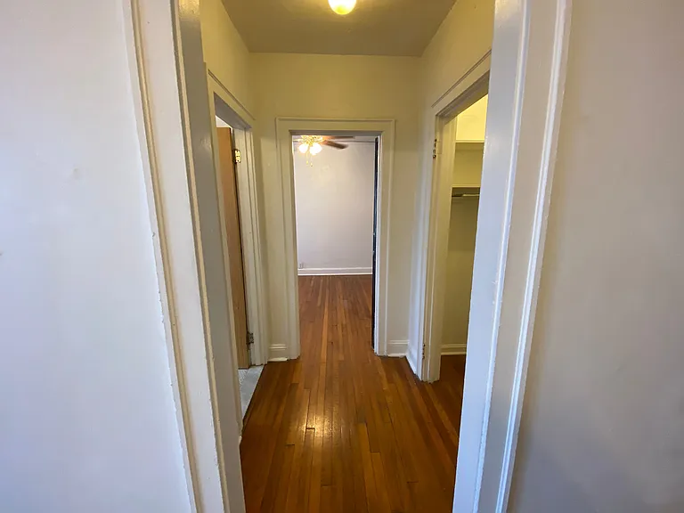 The hallway - the left leads into the restroom, to the right is a spacious walk in closet, and straight ahead is your future bedroom.