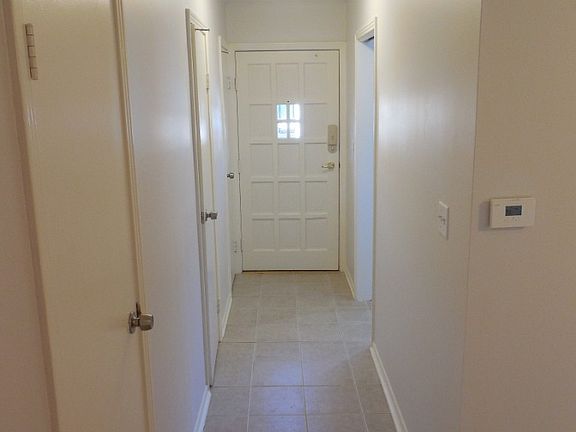 Front hall. Includes pantry, half-bath, and coat closet.