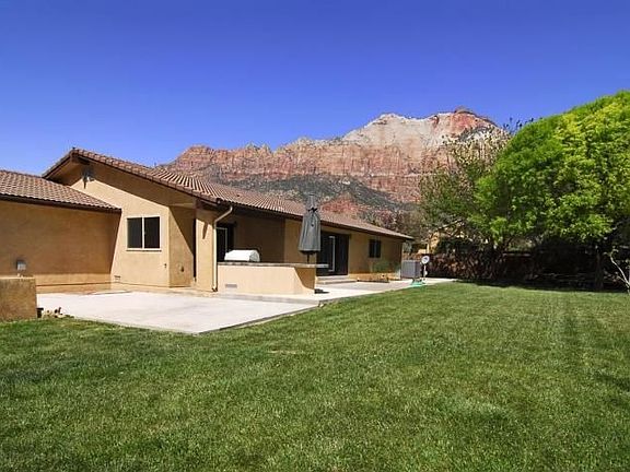 Serene Backyard with Outdoor Kitchen