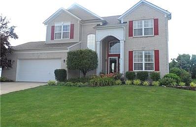 Front entrance of this beautiful with perennials planted all around the homw