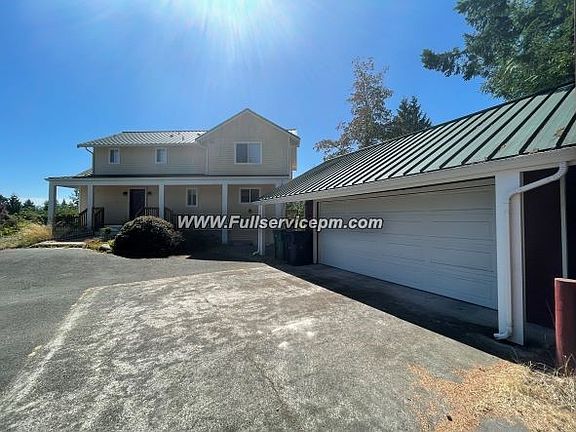 Front of home and garage_07272021