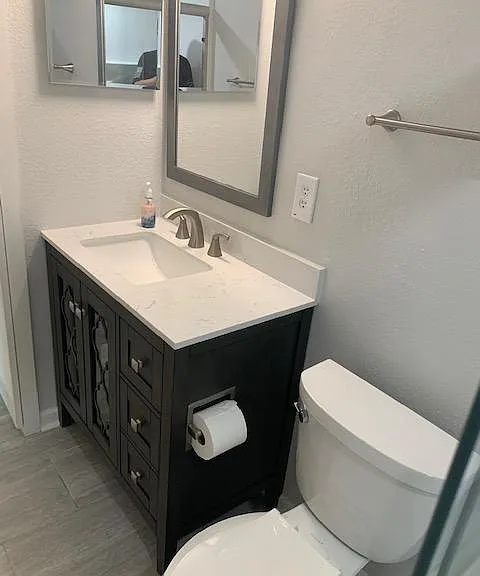 New vanity, medicine cabinet, and mirror