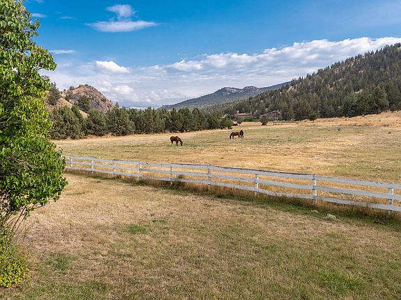 Pasture behind the home with horses