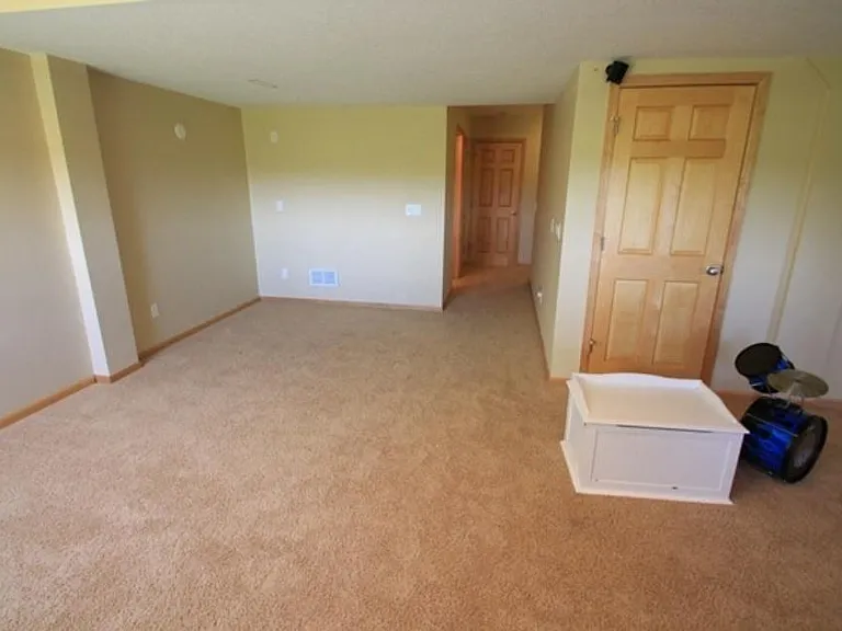 8487 Jonquil Ln N — Photo 12