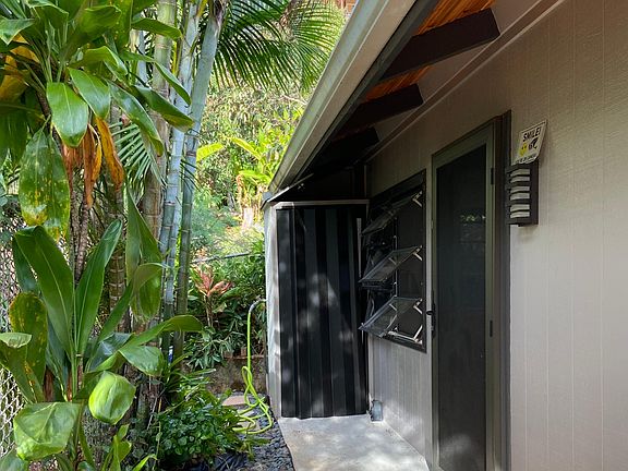 Private entrance; on forest line; stacked washer dryer in closet straight ahead. 50 ft long; and 6+ feed wide of the fenced area, with a gate for entry and also a place for gardening/raised garden beds. All yours and private