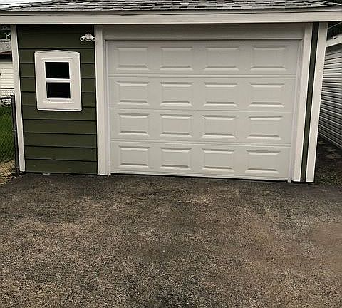 Garage-New door,siding,roof